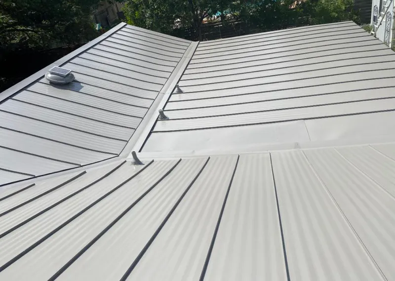 Solar attic fan installed on a metal roof for Roof Ventilation in Thermalito